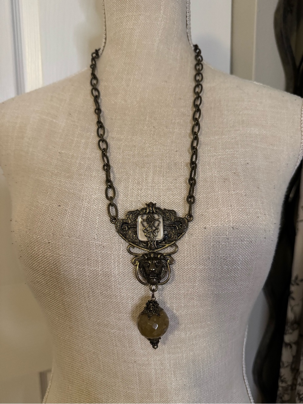 Antique-Style Bronze Pendant Necklace with Lion and Stone Accent